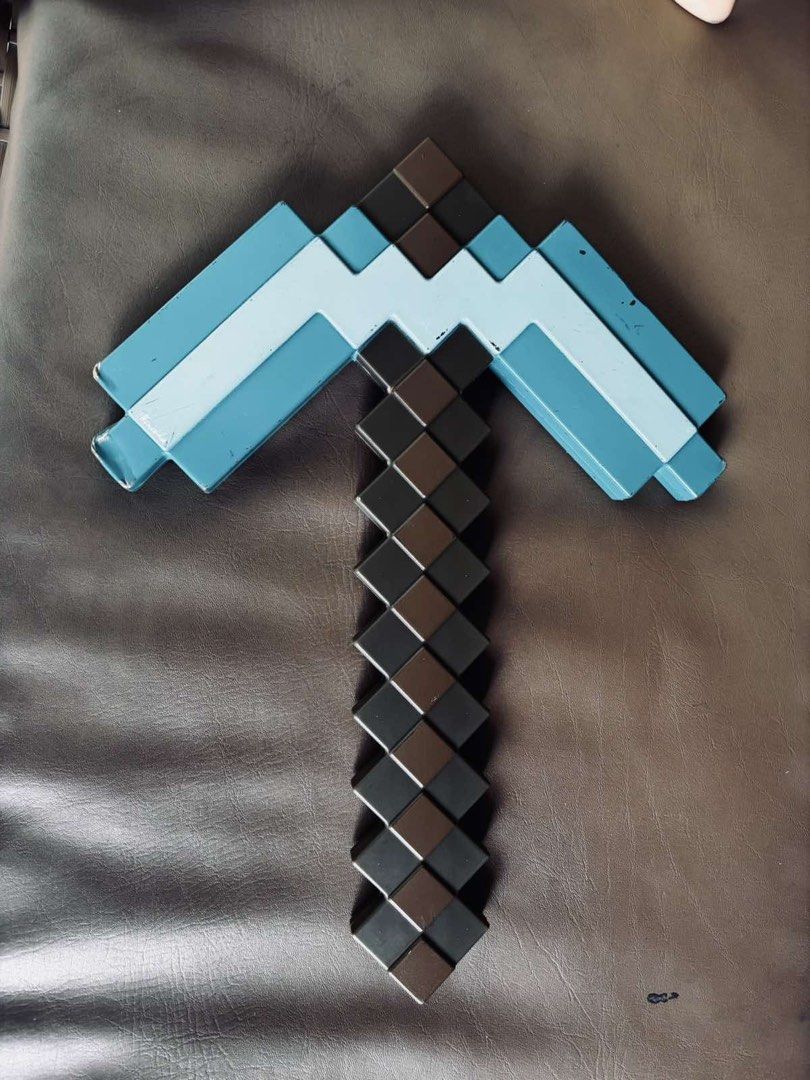 Minecraft Diamond Pickaxe (Category: In-Game Products) located in Manila. Submitted by millenial_cabinet (Listing ID 1450354515, Image 2). Description: -With minor dents -40 cm long and 29 cm wide.