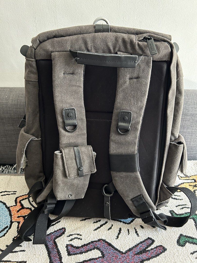 National Geographic Camera Backpack (Category: Backpacks) located in Calamba. Submitted by chwbcca (Listing ID 1450324547, Image 2). Description: - Grey National Geographic canvas backpack - Main compartment with padded dividers for camera gear - Multiple pockets and compartments for organization - Adjustable straps for comfortable carrying - Durable material for long-lasting use - Ideal for photographers and everyday adventures -National Geograp