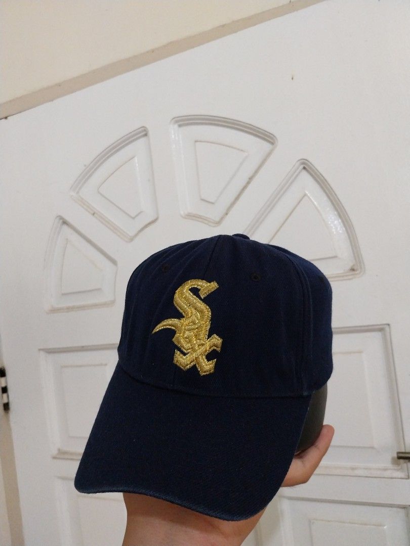 New Era MLB Navy Blue Baseball Cap (Category: Caps & Hats) located in Davao. Submitted by thegraildept2026 (Listing ID 1450391409, Image 1). Description: - Navy blue baseball cap - Features gold embroidery on the side and back - MLB logo clearly visible - Interior also shows MLB logos and text - Ideal for any baseball enthusiast.