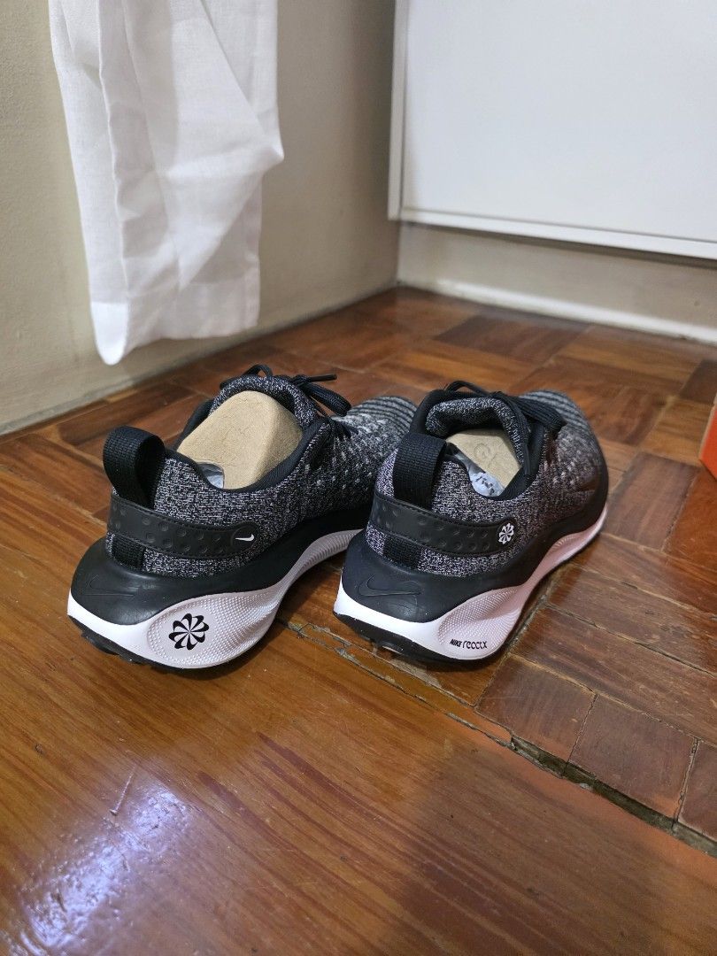 Nike ReactX Inifinity 4 womens Running Shoes (Category: Sneakers) located in Pateros City. Submitted by bullark29 (Listing ID 1450421949, Image 2). Description: - Nike Zoom Fly 4 running shoes - Color: Black and grey knit upper - White sole with black accents - Lace-up closure - Ideal for training or everyday wear - Includes original box.