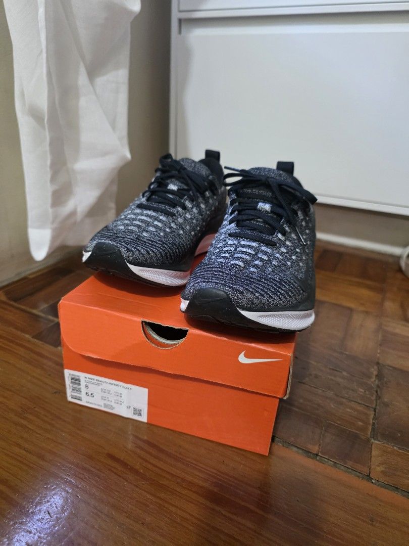 Nike ReactX Inifinity 4 womens Running Shoes (Category: Sneakers) located in Pateros City. Submitted by bullark29 (Listing ID 1450421949, Image 3). Description: - Nike Zoom Fly 4 running shoes - Color: Black and grey knit upper - White sole with black accents - Lace-up closure - Ideal for training or everyday wear - Includes original box.