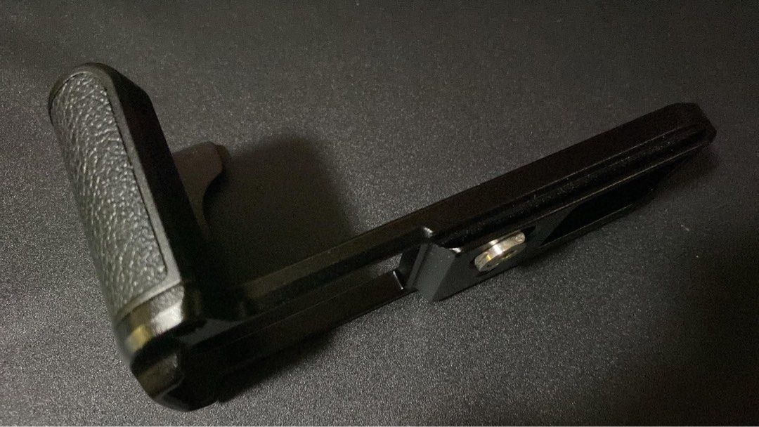 Nikon ZF GR1 Extension Grip (Category: Other Photography Accessories) located in Quezon City. Submitted by jjajjphoto (Listing ID 1450336062, Image 1). Description: - Enhance your camera's ergonomics with this black metal grip. - Attaches securely to the bottom of your camera. - Provides a more comfortable and stable handheld shooting experience. - Features a standard tripod mount screw for versatility. - Solid, durable construction for long-last