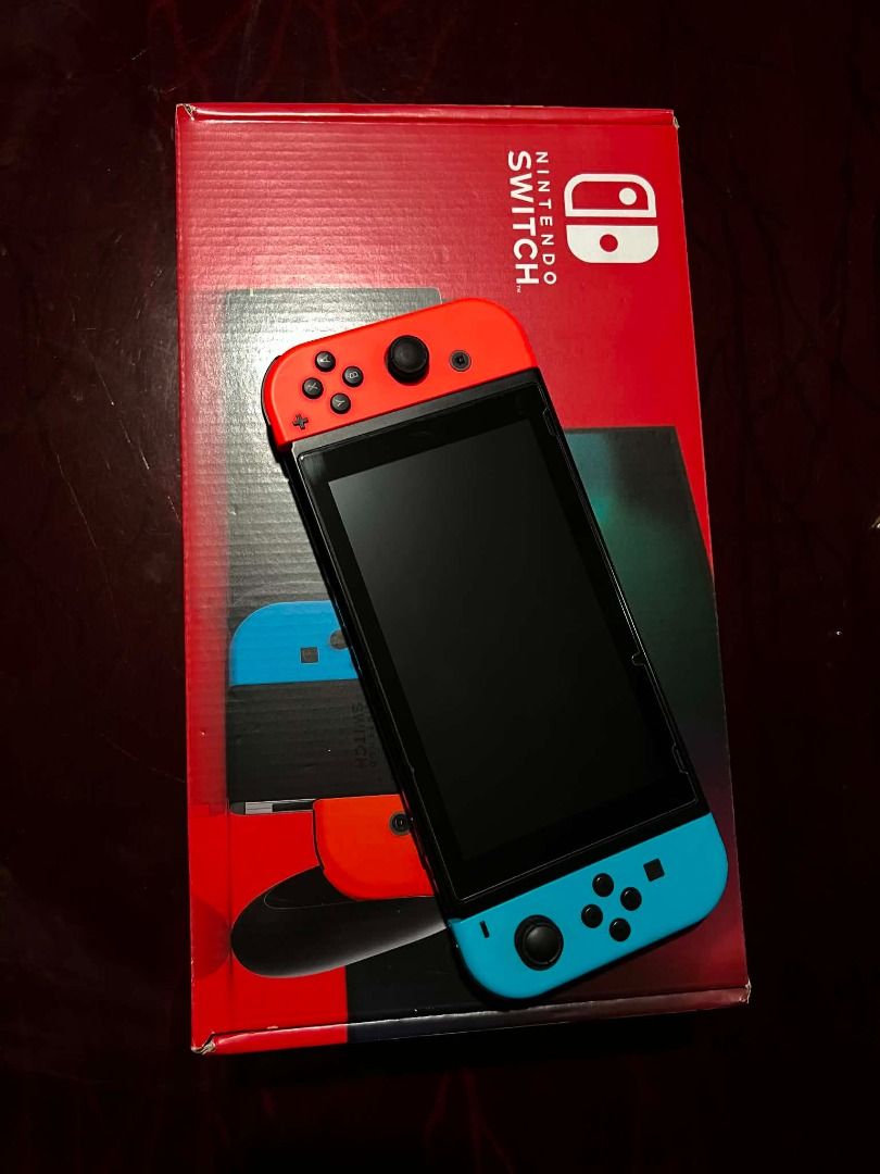 Nintendo Switch Console with Neon Blue and Red Joy-Cons (Category: Nintendo) located in Caloocan City. Submitted by stephenx.7 (Listing ID 1450357196, Image 2). Description: Nintendo Switch V2 Console - Complete Set - Lightly used, Purchased in Japan 🎮 Nintendo Switch V2 Console 🔵🔴 Neon Blue & Neon Red Joy-Cons 📦 Includes Original Box ✅ Complete with All Original Accessories 🏠 Play on your TV or take it on the go ✅ Fully functional and ready