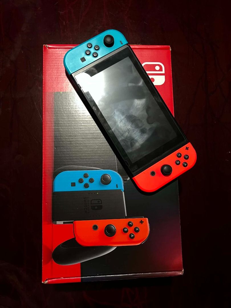Nintendo Switch Console with Neon Blue and Red Joy-Cons (Category: Nintendo) located in Caloocan City. Submitted by stephenx.7 (Listing ID 1450357196, Image 3). Description: Nintendo Switch V2 Console - Complete Set - Lightly used, Purchased in Japan 🎮 Nintendo Switch V2 Console 🔵🔴 Neon Blue & Neon Red Joy-Cons 📦 Includes Original Box ✅ Complete with All Original Accessories 🏠 Play on your TV or take it on the go ✅ Fully functional and ready