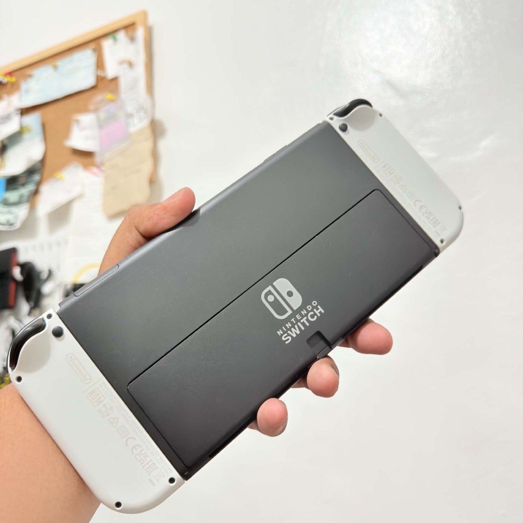 Nintendo Switch OLED White Console (Category: Nintendo) located in Caloocan City. Submitted by rjane1204 (Listing ID 1450333675, Image 2). Description: - Nintendo Switch OLED Model (White) - Large, vibrant OLED screen for stunning visuals - Perfect for both home console and handheld gaming - Ideal for solo adventures and multiplayer sessions - Experience crisp details and immersive gameplay -No box -Complete accessories Dock replacement only -Wil