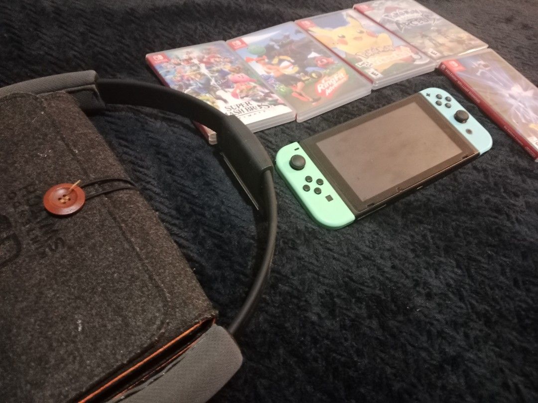 Nintendo Switch v2 W/ games (Bundle only) (Category: Nintendo) located in Manila. Submitted by its_viii (Listing ID 1450511558, Image 2). Description: Nintendo Switch v2 Inclusions: -Switch Pouch -Ring Fit Games: - Pokemon: Arceus - Pokemon: Lets Go Pikachu - Pokemon: Brilliant Diamond - Super Smash Brothers - RingFit.