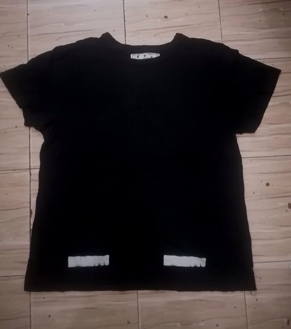 OFF-WHITE Black Graphic T-Shirt Size M (Category: Tshirts & Polo Shirts ) located in Cebu City. Submitted by roadthrift (Listing ID 1450428515, Image 1). Description: - Brand: OFF-WHITE - Color: Black - Size: M - Features: Signature graphic print on front and back - Material: 100% Cotton - Style: Casual wear.