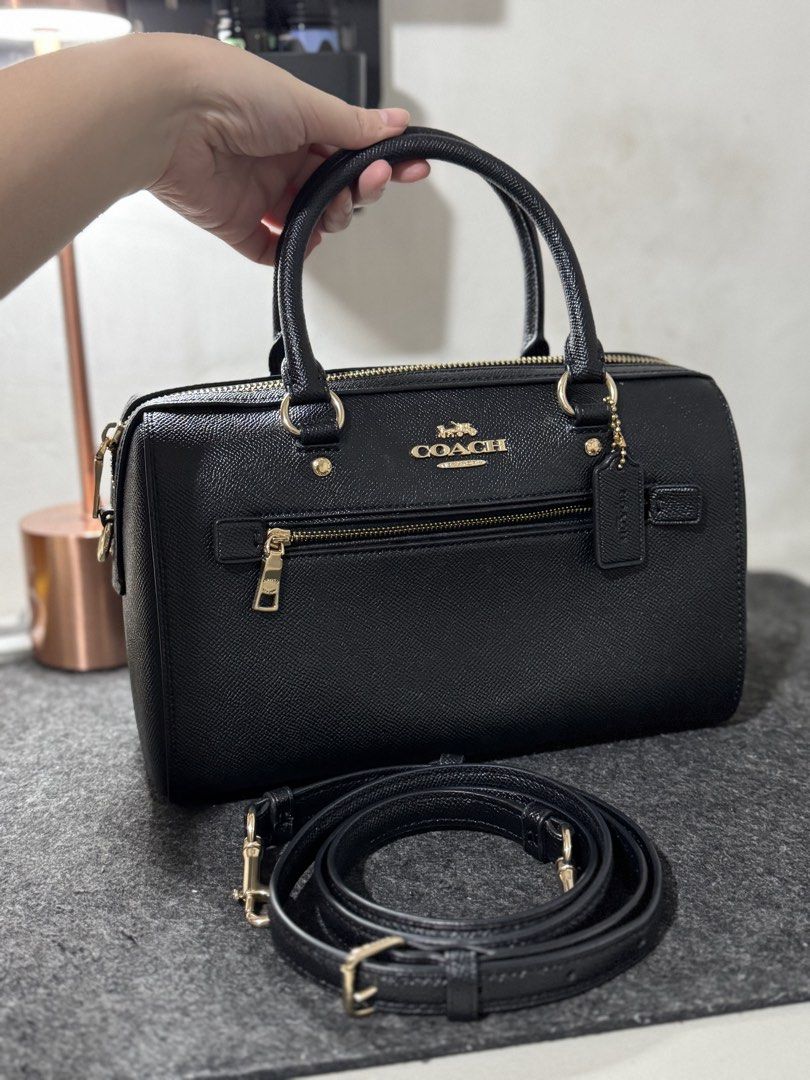 Original Coach Rowan Satchel Bag with Strap (Category: Luxury Bags & Wallets) located in Manila. Submitted by annchariz (Listing ID 1450328750, Image 3). Description: 🖤 Coach Rowan Satchel – Black with Gold Hardware ✨ Like new ✔️ No flaws ✔️ Barely used ✔️ Authentic • Original from USA ✔️ Spacious – Perfect as a work bag for office girlies or everyday bag 💸 Super Sale: ₱5,900 📍 Meet-up: Near Putatan, Muntinlupa 📦 Shipping available RFS: Hindi