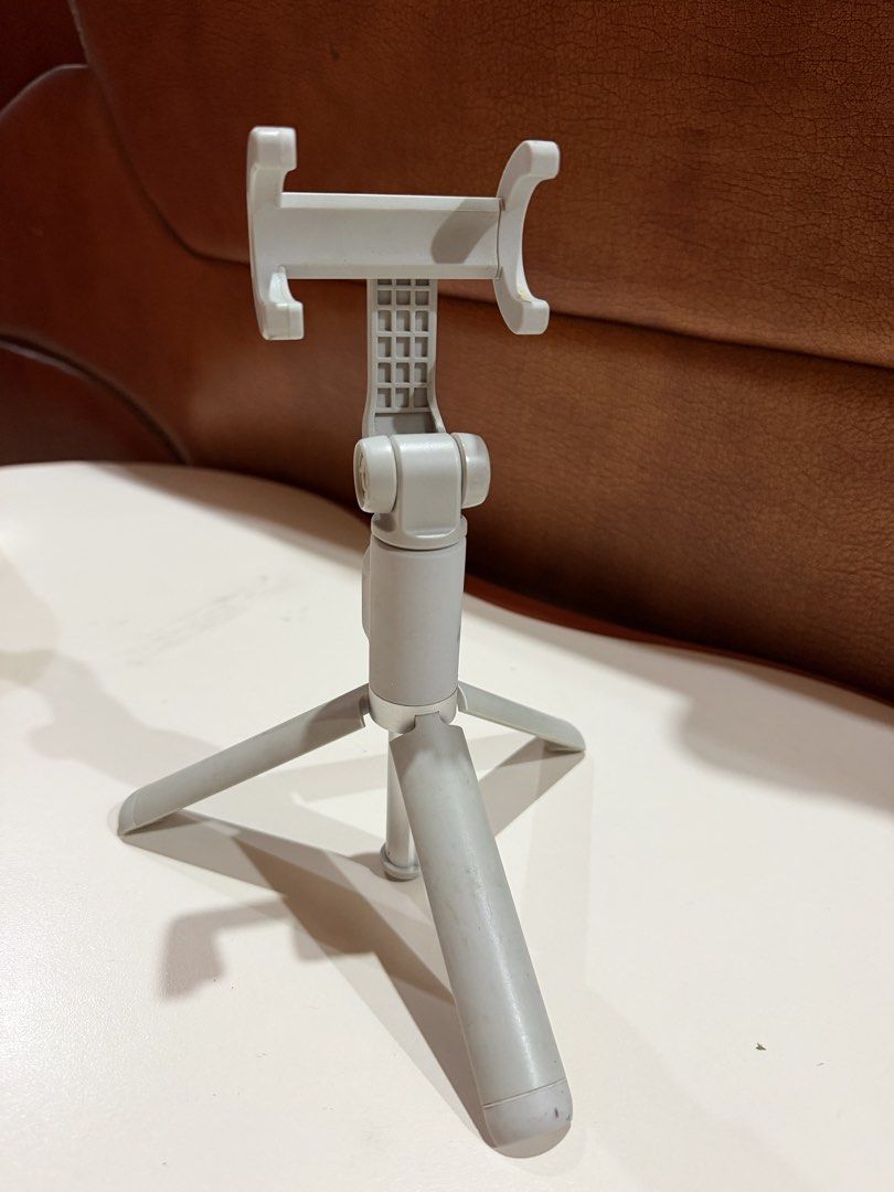 Original Xiaomi Bluetooth Selfie Stick Tripod | USB Rechargeable (Category: Tripods & Monopods) located in Pagsanjan. Submitted by livefalcon_b699f0 (Listing ID 1450368435, Image 3). Description: * Original Xiaomi product * Bluetooth remote shutter included * USB rechargeable (charging cable included) * Extends up to approximately 0.5 meter * Tripod and selfie stick in one * Fully functional * Visible signs of use * One screw cover is missing but