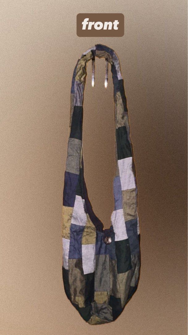 Patchwork Shoulder Bag (Category: Shoulder Bags) located in Singapore. Submitted by mahrazrn (Listing ID 1448989329, Image 1). Description: - Unique patchwork design with varied colors and textures - Secure single button closure - Long, comfortable shoulder strap - Ideal for everyday use -Only used it once Sizing: -Strap drop (top to bag opening): ~45–55 cm -Bag height (body only): ~30–35 cm -Bag width: ~28–35 cm.