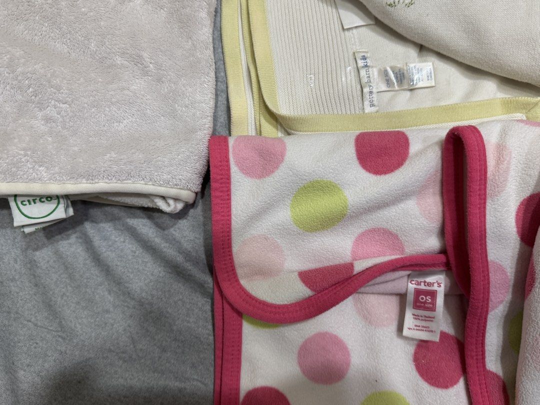 Peter Rabbit Baby Blankets (Bundle) (Category: Babies & Kids Fashion) located in Muntinlupa City. Submitted by readthedetails (Listing ID 1450456980, Image 2). Description: - Bundle of 4 baby blankets - 1 white 'Baby Boy' blanket with embroidery - 1 white blanket with Peter Rabbit design - 2 Carter's swaddles (pink, green, white polka dots) - Soft and cozy for your little one.