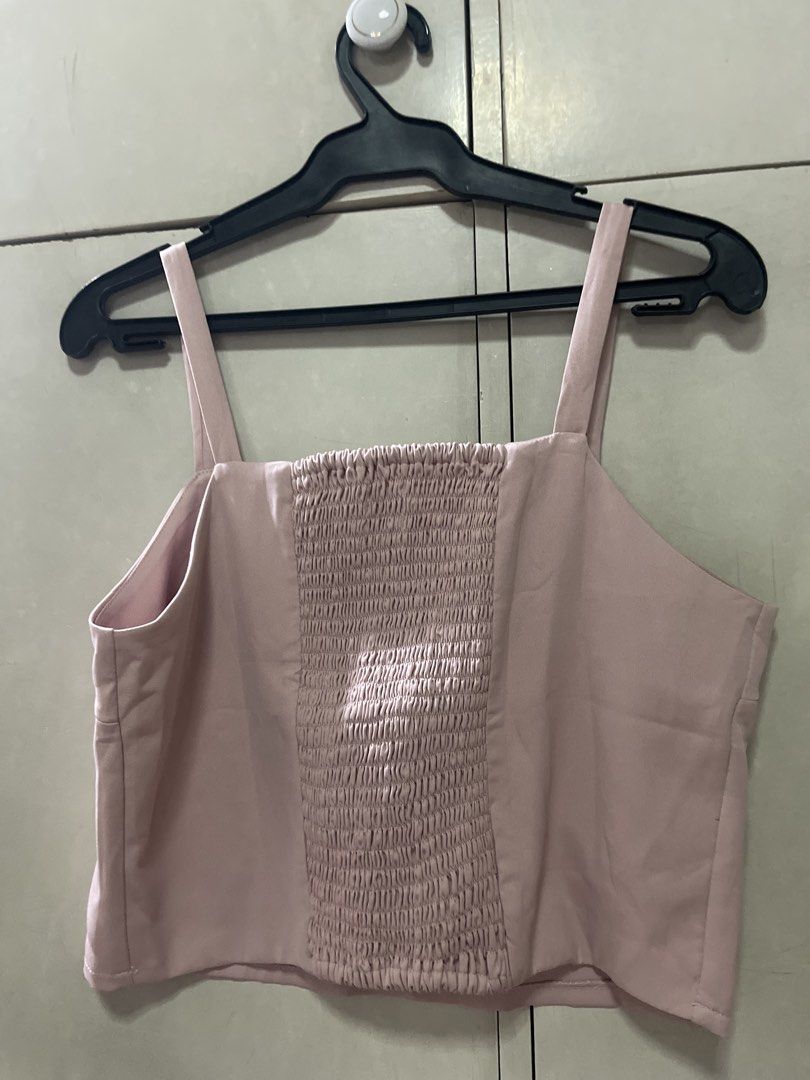 Plains & Prints Smocked Square Neck Crop Top (Category: Blouses) located in Quezon City. Submitted by lespyjamas (Listing ID 1450399772, Image 2). Description: - Cute pink smocked crop top - Brand: Plains & Prints - Neckline: Square - Features: Adjustable straps, smocked bodice for comfortable fit - Style: Versatile, great for casual outings or dressing up - Pairing: Easy to match with skirts or shorts.