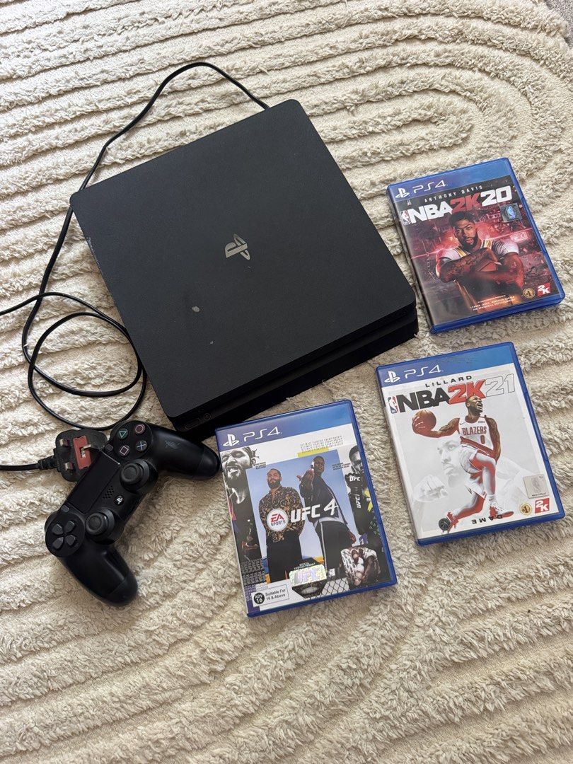 Playstation 4 PS4 Slim Console with Controller and 3 Games (Category: PlayStation) located in Pasig City. Submitted by springcleaning.mnl (Listing ID 1450383528, Image 1). Description: - PlayStation 4 Slim Console - 1 Black DualShock 4 Controller - 3 Games Included: NBA 2K20, NBA 2K21, UFC 4 - All game discs are in their original cases - Ready for immediate gaming!.