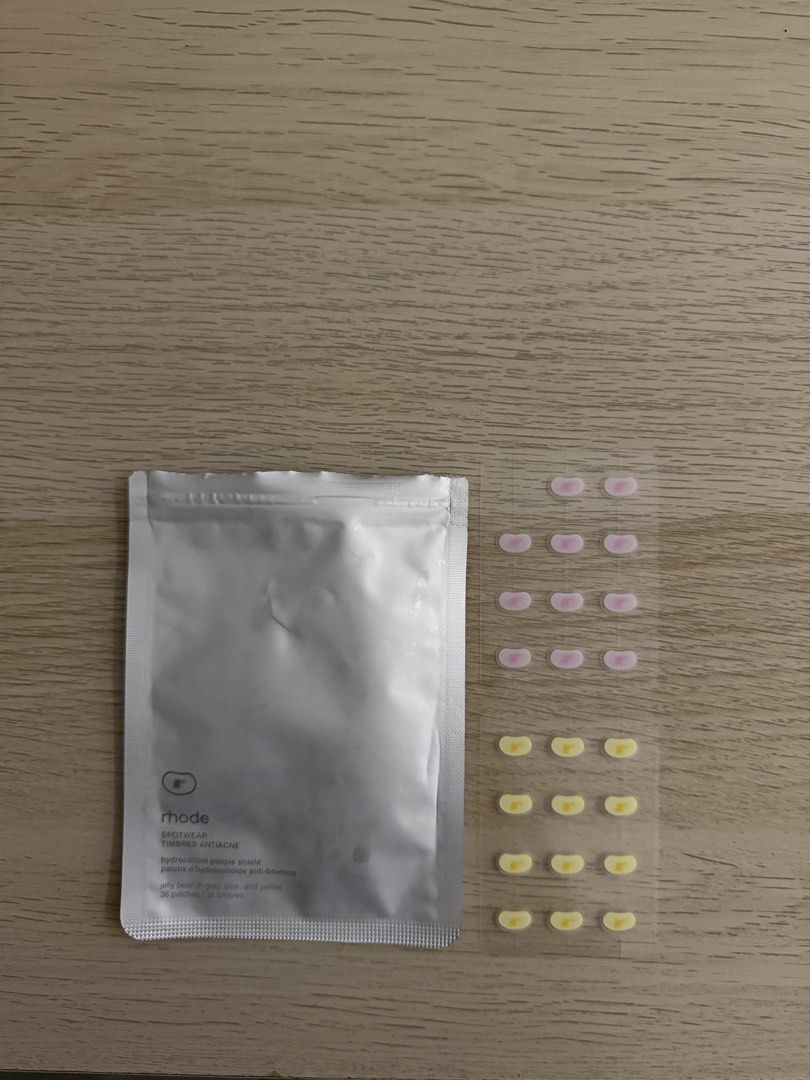 Rhode Spotwear Hydrocolloid Pimple Shields - Jelly Bean (Category: Face Care) located in Makati City. Submitted by iamruka (Listing ID 1450515596, Image 1). Description: loc: makati 2 sheets available last price already ₱1,150 - Rhode Spotwear hydrocolloid pimple shields - Available in jelly bean colors: grey, pink, and yellow - Helps cover and protect pimples - Easy to apply and discreet - Perfect for on-the-go skincare needs.