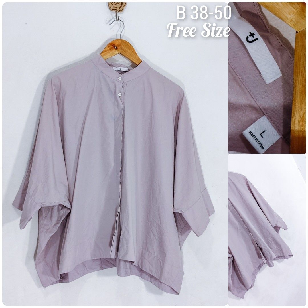 SALE Uniqlo Top (Category: Blouses) located in Marikina City. Submitted by closetessentials07 (Listing ID 1450420229, Image 1). Description: issue light blue stain free size.