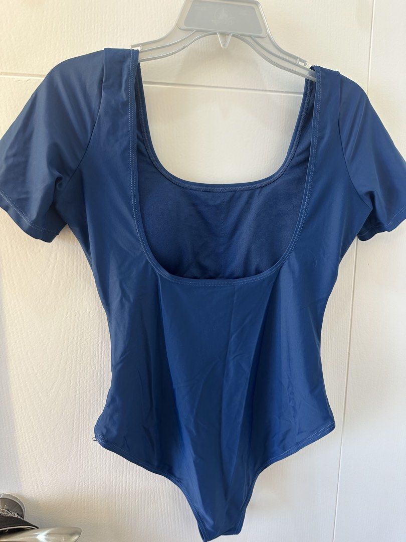 Sassa Bodysuit - Black & Blue - Size XL (Category: Others Tops) located in Pasay City. Submitted by behua (Listing ID 1450402385, Image 2). Description: - Set of two Sassa bodysuits - Available colors: Black and Royal Blue - Size: XL - Features: Short sleeves, scoop neckline - Royal Blue bodysuit includes built-in bra cups for added support - Versatile: Ideal for layering or wearing as a standalone piece No meet up.