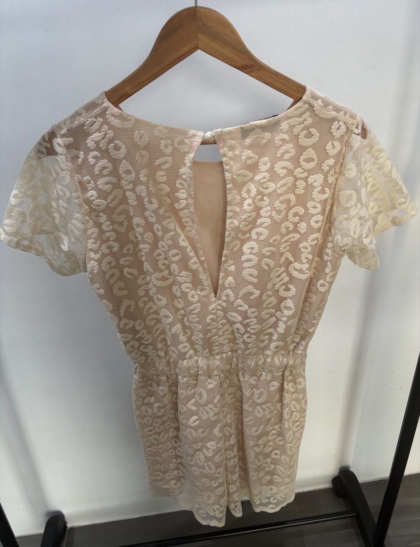 Sheer Leopard Print Lace Romper with Short Sleeves (Category: Rompers) located in Mandaue City. Submitted by offthehanger26 (Listing ID 1450379929, Image 2). Description: - Sourced from Thailand! - One of my favorite pieces with its unique print and sheer leopard-like print overlay🐆 - Soft nude lining - Stylish back keyhole cutout for flattering fit.