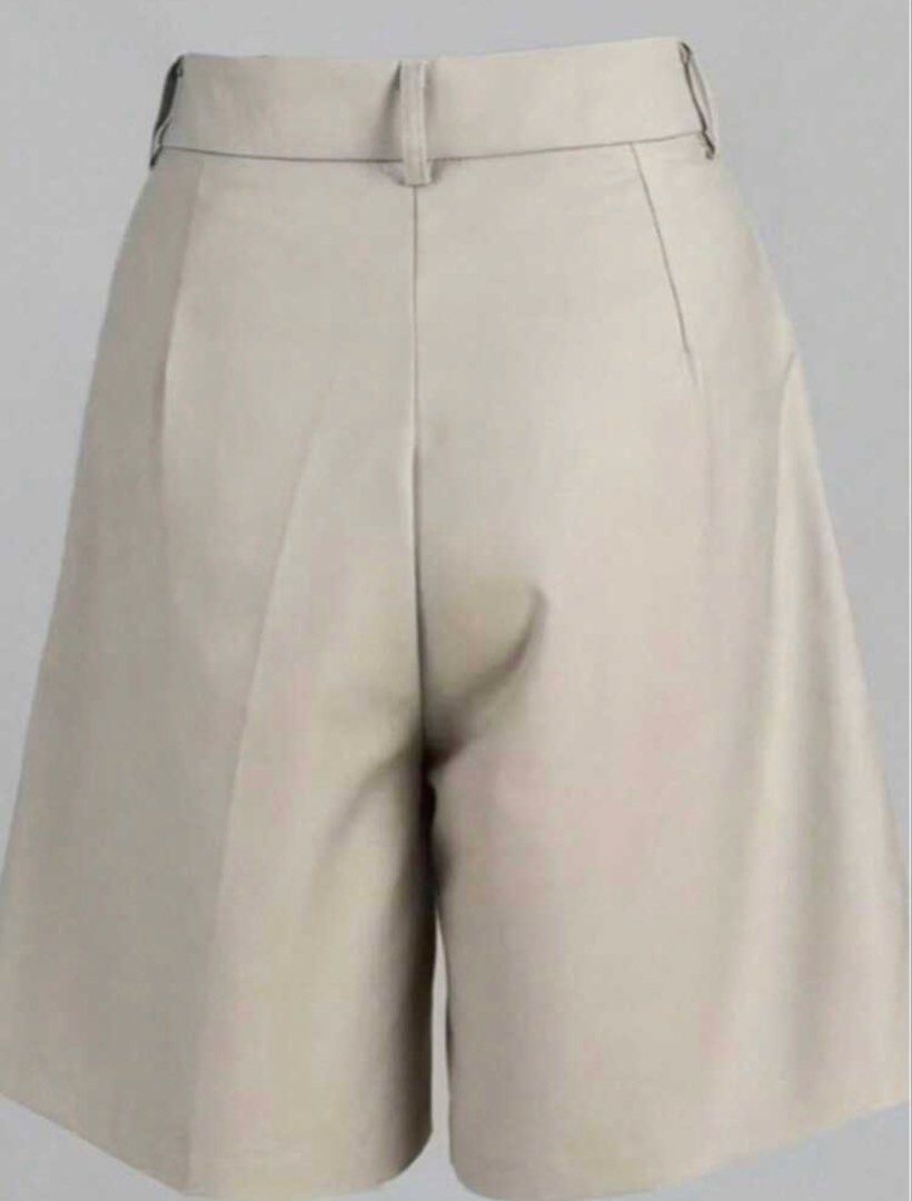 Shein Bermuda Shorts in Brown (Category: Other Bottoms) located in Mandaluyong City. Submitted by blzstr (Listing ID 1450429474, Image 3). Description: - Chic khaki culottes or bermuda shorts - High-waisted design - Flattering pleats - Comfortable wide leg - Versatile - Nice fabric drape - Front button and zip closure.