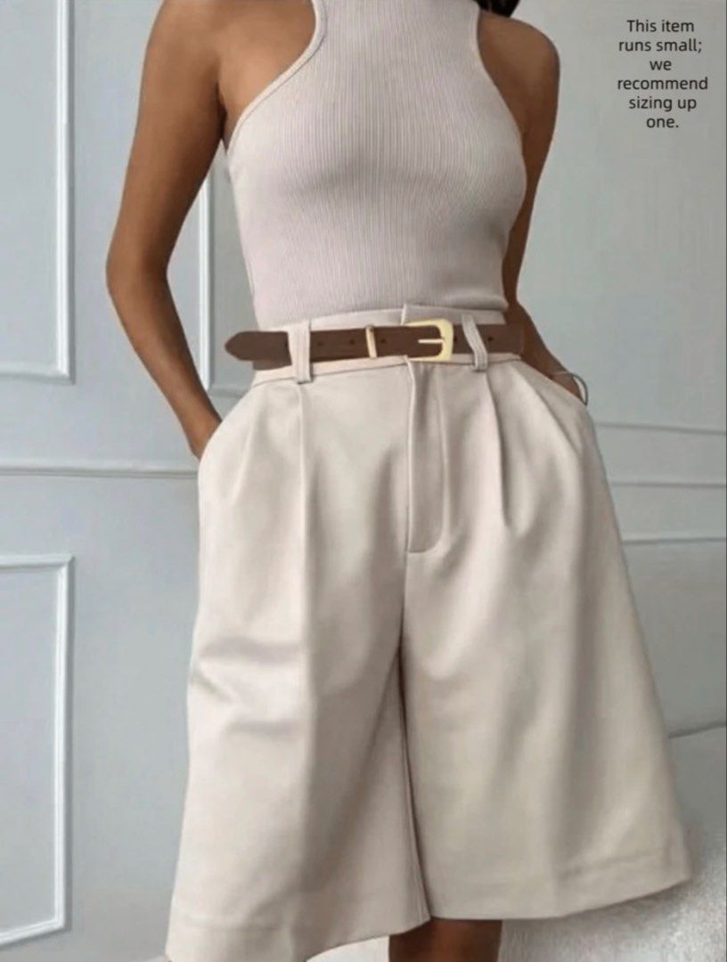 Shein Bermuda Shorts in Brown (Category: Other Bottoms) located in Mandaluyong City. Submitted by blzstr (Listing ID 1450429474, Image 1). Description: - Chic khaki culottes or bermuda shorts - High-waisted design - Flattering pleats - Comfortable wide leg - Versatile - Nice fabric drape - Front button and zip closure.
