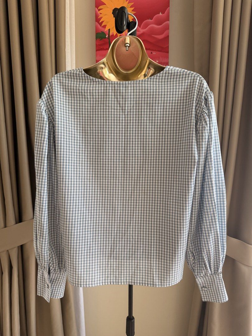 SHEIN light blue and White Gingham Long Sleeve Top (Category: Blouses) located in Cavite. Submitted by ohalexa (Listing ID 1450436707, Image 2). Description: -buttoned cuff ➡️this item is preloved, please manage your expectations. ➡️please look at the photos, flaws are posted if there are any. ➡️color may vary due to lighting and photo quality. ➡️mannequin’s size: s/m 34-26 Rfs: to support dog needs 🐕 ➡️Mode of delivery: -j&t (minimum ₱75 delive