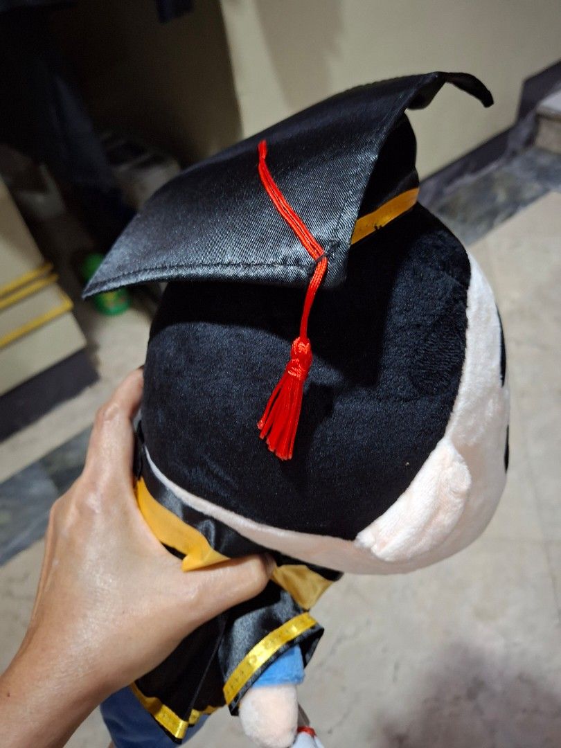 Shin Chan Graduation Plush Toy (Category: Plushies & Soft Toys) located in Quezon City. Submitted by pure_trinsky (Listing ID 1450479556, Image 3). Description: - Adorable graduation plush toy - Features a graduation gown and cap - Includes a 'Congratulations' scroll - Brand: YUENHE - Ideal gift for any graduate.