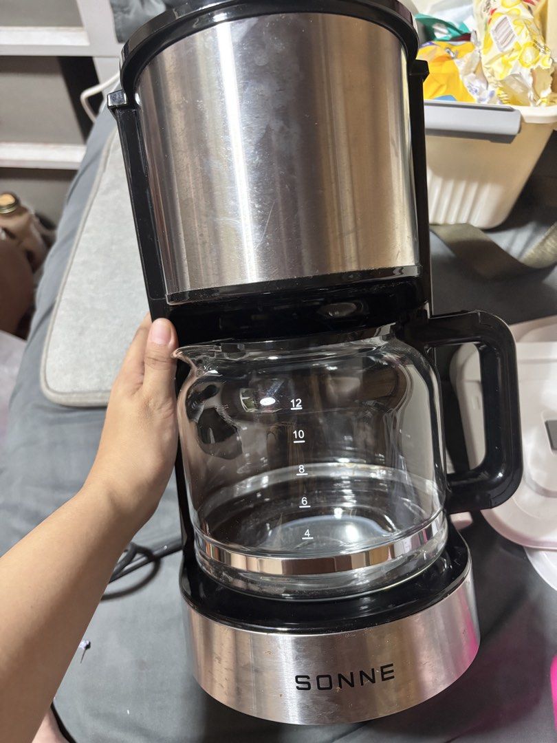 SONNE Drip Coffee Maker with Glass Carafe (Category: Coffee Machines & Makers) located in Muntinlupa City. Submitted by kaorriii (Listing ID 1450494561, Image 1). Description: - Sonne Drip Coffee Maker - Includes 12-cup glass carafe - Comes with reusable filter and scoop - never been used -With box.