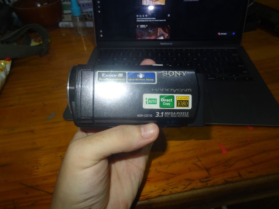 SONY HDR-CX110 (Category: Video Cameras) located in Las Pinas. Submitted by palancaren (Listing ID 1450480465, Image 2). Description: SONY HDR-CX110 This handycam unit is well-maintained, smooth, fully functional, and ready to use. Features: - 1920 X 1080 HD - Memory Stick Media Slot - SD/SDHC/SDXC Memory Card Compatible - 3MP Still Image Capture - 1/4" Exmor R CMOS - 2.7" Wide Clear Photo LCD - 30mm Carl Zeiss Vario-Tessar - 25x Optical Zoom - F