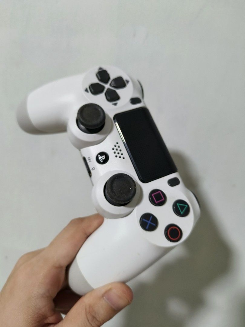 Sony PlayStation 4 DualShock 4 PS4 Wireless Controller White (Category: Controllers) located in Manila. Submitted by budgetcache (Listing ID 1450408455, Image 3). Description: Defective PS4 DualShock 4 Controller – For Parts, Repair, or Retro Gaming Selling a defective PS4 DualShock 4 controller. It has the following issues: - Left analog stick has ghosting/stick drift. - L1 button does not work. - Start/Options button loose - Battery drains quic