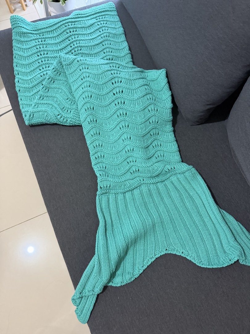 Teal Knitted Cozy Mermaid Throw Blanket (Category: Cushions & Throws) located in Taguig. Submitted by agirlwithluv (Listing ID 1450376171, Image 1). Description: - knitted - comfy - shipping c/o buyer.