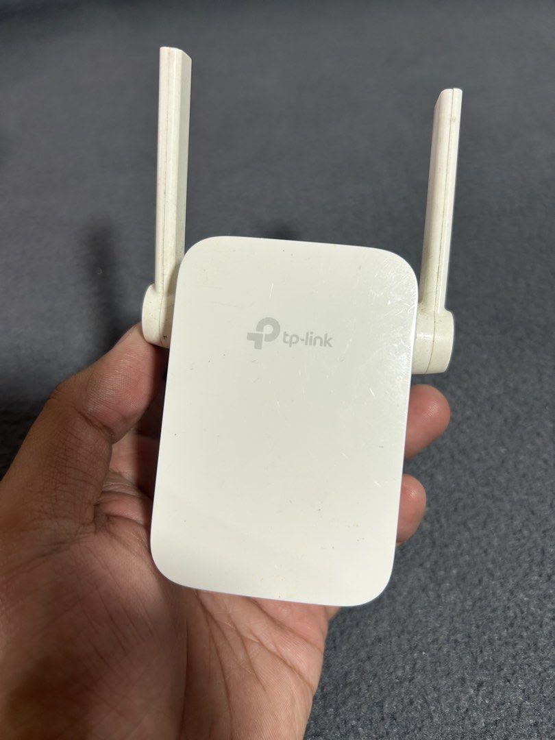 TP-Link Wi-Fi Range Extender (Category: Networking) located in Baguio. Submitted by tristanzachary (Listing ID 1450519180, Image 1). Description: - TP-Link Wi-Fi Range Extender - Boosts and extends your Wi-Fi signal - Plugs directly into a wall outlet for convenience - Easy and quick setup process - Eliminates Wi-Fi dead spots in your home - Compatible with all standard routers.