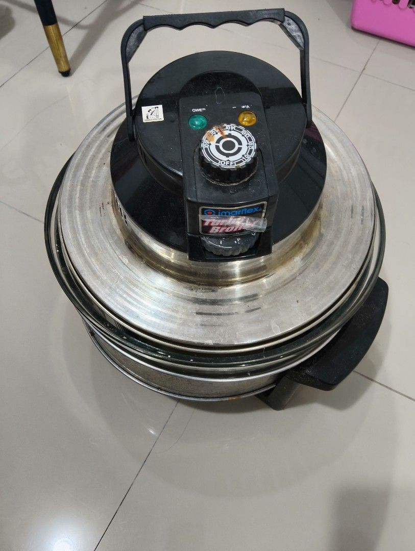 Turbo Broiler Oven Imarflex (Category: Ovens & Toasters) located in Caloocan City. Submitted by goldenstone.de9f00 (Listing ID 1450473370, Image 1). Description: - Turbo Broiler Oven - Glass bowl with stainless steel rim - Black lid with controls and handle - Works well, perfect for roasting, -baking, and more - Easy to clean - Some signs of use on metal parts -11 liters .