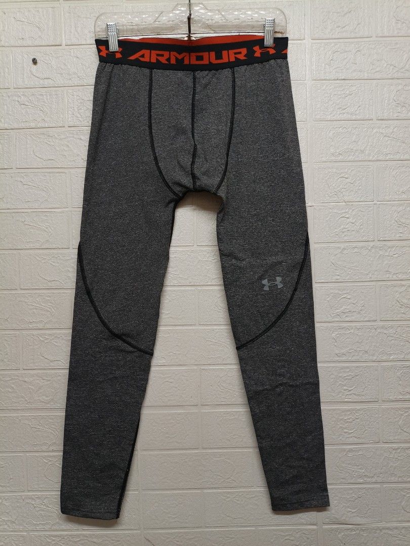 Under Armour HeatGear Compression Tights M/P (Category: Activewear) located in Quezon City. Submitted by rod_raymundo (Listing ID 1450526987, Image 1). Description: - Under Armour HeatGear Compression Tights - Color: Grey with Orange Waistband - Size: Medium (M/P) - Origin: Made in Jordan - Ideal for: Workouts, layering - Benefits: Provides warmth and support.
