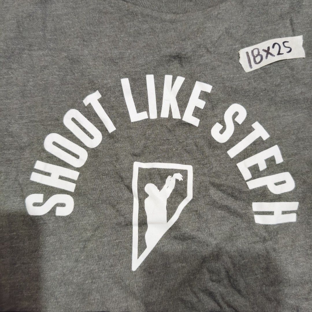 Under Armour SC30 "Shoot Like Steph" & "Threezy Does It" T-shirts (Category: Tshirts & Polo Shirts ) located in Paranaque City. Submitted by bella0712 (Listing ID 1450503912, Image 3). Description: - Bundle Deal: Get both Under Armour t-shirts! - Size: YXL/JTG/FBG - Grey T-shirt: Features 'Shoot Like Steph' graphic - Light Blue T-shirt: Features 'Threezy Does It' print and small graphic pattern - Perfect for basketball fans and Steph Curry enthus