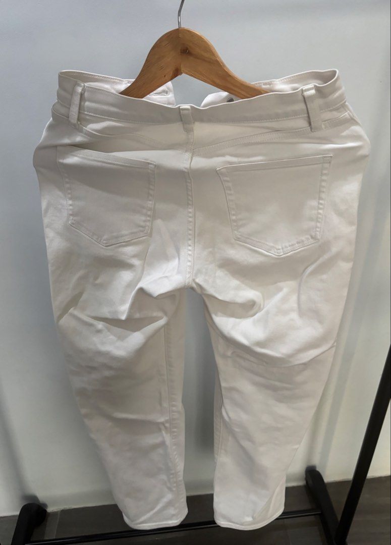 UNIQLO JEANS White Denim Pants (Category: Jeans) located in Mandaue City. Submitted by offthehanger26 (Listing ID 1450378021, Image 2). Description: - Originally bought for 1k+ - Can fit xs-s frames - The perfect classic white jeans; pairs well with everything!🤍 - Minor marks on front (visible in last three photos).