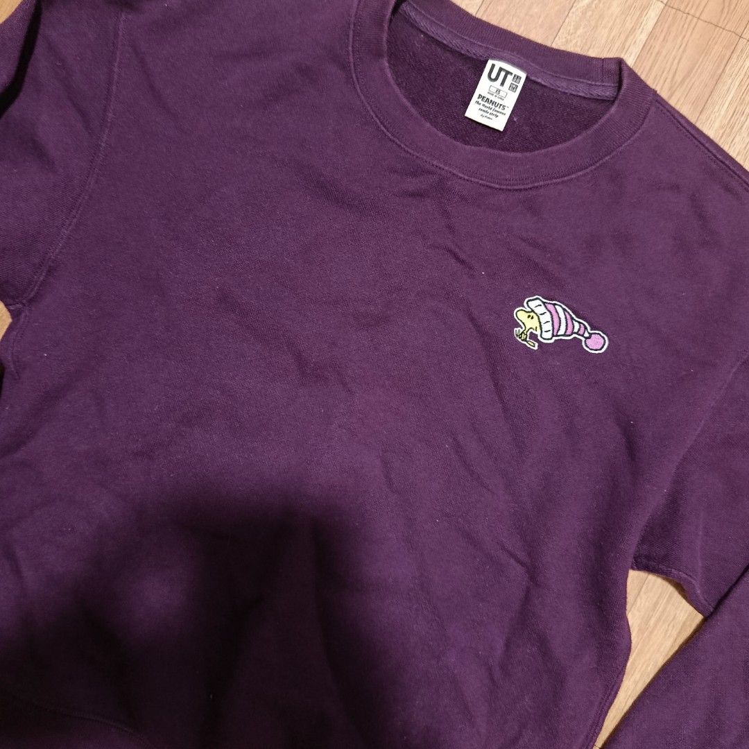 UNIQLO UT Peanuts Snoopy Maroon Sweatshirt (Category: Longsleeves) located in Quezon City. Submitted by addyyy19 (Listing ID 1450467328, Image 2). Description: UT SNOOPY PEANUT collab sweater. - Maroon - Original.