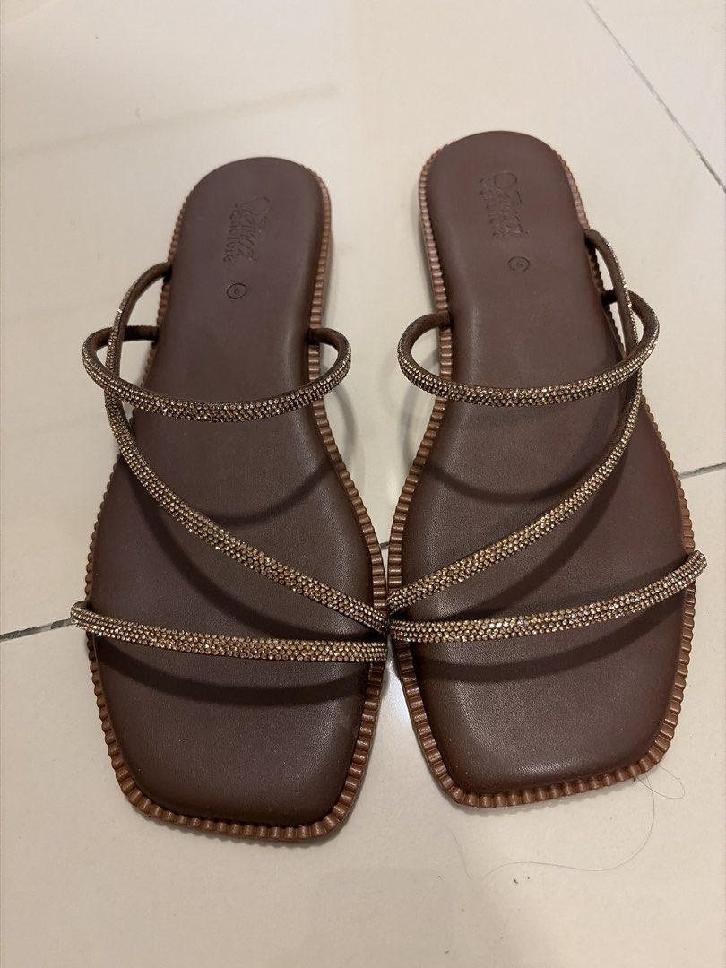 Embellished Flat Sandals EU40 (Category: Sandals) located in Kuala Lumpur. Submitted by preloverjn (Listing ID 1450412855, Image 1). Description: - Worn once - Stylish brown flat sandals - Features thin, embellished straps - Modern square toe design .