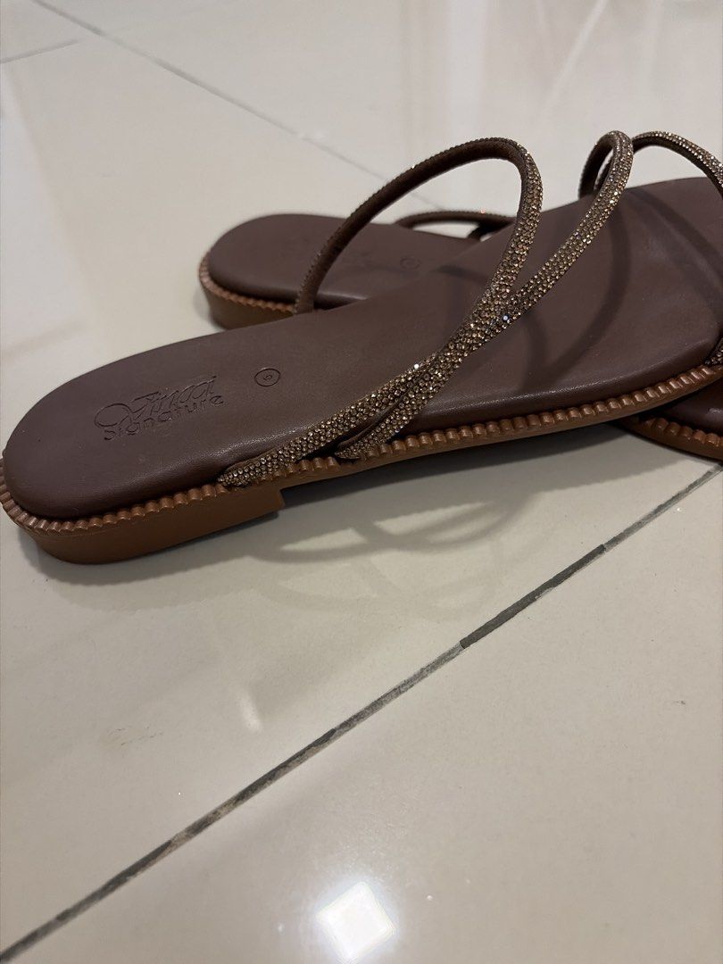 Embellished Flat Sandals EU40 (Category: Sandals) located in Kuala Lumpur. Submitted by preloverjn (Listing ID 1450412855, Image 2). Description: - Worn once - Stylish brown flat sandals - Features thin, embellished straps - Modern square toe design .