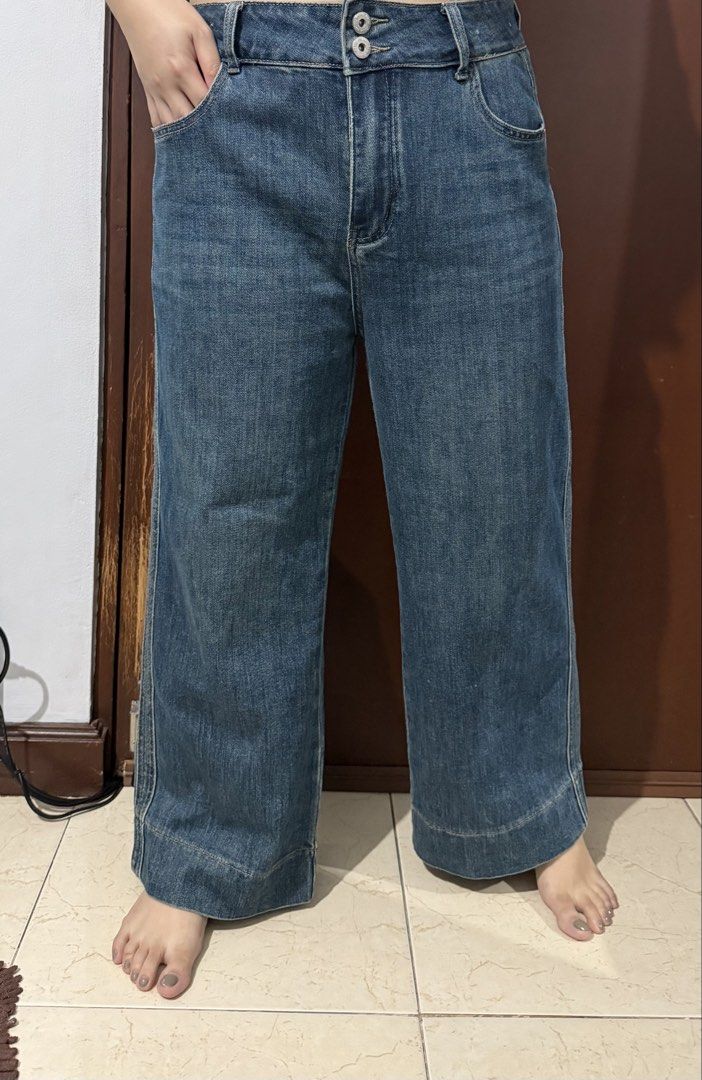 Wide Leg High Waist Jeans (Category: Jeans) located in Mandaluyong City. Submitted by blzstr (Listing ID 1450433126, Image 1). Description: - Style: Wide leg denim jeans - Size: 4XL on tag but fits large well - waist 33inches - slightly stretchy - Color: Classic blue wash - Closure: Double button at waist - Pockets: Two front, two back - Fit: Relaxed, with wide leg opening.