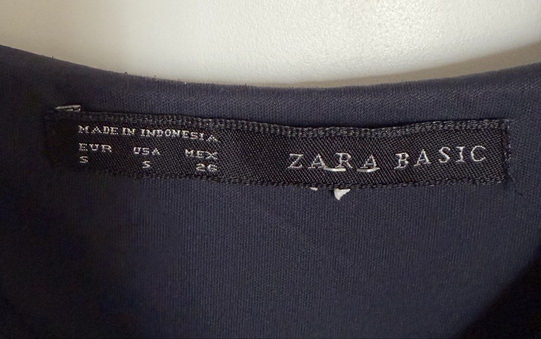 Zara Basic Black Spaghetti Strap Tiered Dress Size S (Category: Dresses) located in Kuala Lumpur. Submitted by ctmj86 (Listing ID 1450354047, Image 3). Description: - Zara Basic black tiered dress - Size S - Features spaghetti straps - Made from lightweight, flowy fabric - Versatile for casual or dressy occasions - Easy to style.