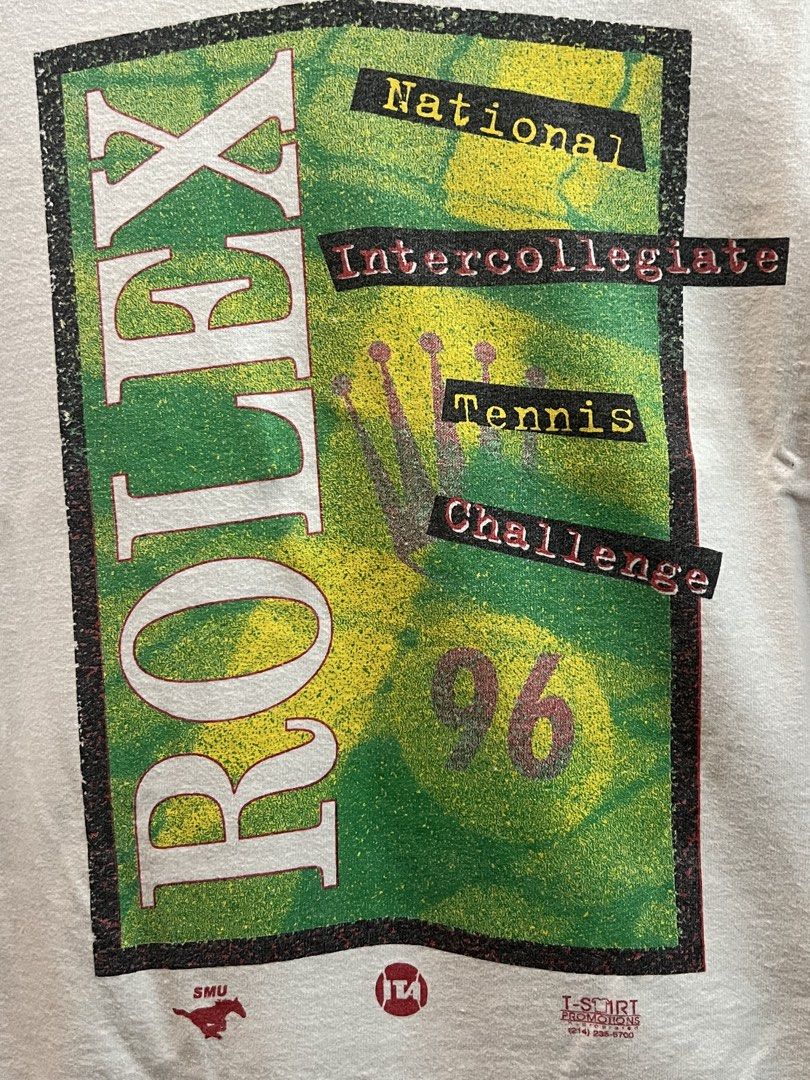 1996 Rolex Promotion Tennis Tee (Category: Tshirts & Polo Shirts ) located in Munoz. Submitted by dong4tti (Listing ID 1450537615, Image 2). Description: W24 L30.5 XL ON TAG FOTL hart tag lofteez DS PRISTINE CONDITION This is a white vintage Fruit of the Loom t-shirt from 1996 featuring graphics for the Rolex National Intercollegiate Tennis Challenge..