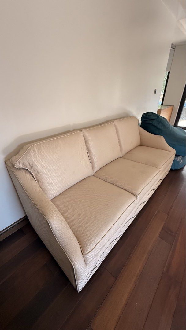 3-Seater Sofa Beige Upholstery (Category: Sofas) located in Quezon City. Submitted by stylesaverph (Listing ID 1450568816, Image 2). Description: - Beige 3-seater sofa - Textured upholstery - Decorative trim along the bottom - Separate cushions - Approximately 2 meters long - Ideal for living room seating.