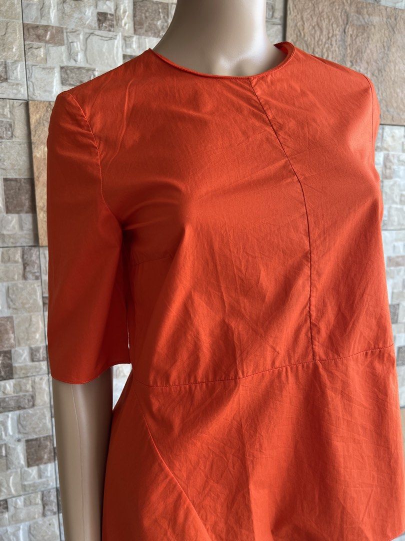 ( FAV! 😍 ) MARNI “ VIBRANT CONSTRUCTED “ TOP (Category: Luxury Apparel) located in Bacolod City. Submitted by timelessbyjosh (Listing ID 1450662569, Image 2). Description: BEST FOR CASUAL & FORMAL OUTFITS SIZE : 40 ACTUAL COLOR : LIGHT ORANGE COLOR RATE : 10 OUT OF 10 CONDITION : NEAR NEW MATERIAL : 100 % COTTON MADE IN : PORTUGAL FLAWS : NONE DIMENSIONS LENGTH - 24 ( FRONT ) & 26 ( BACK ) WIDTH - 17 MEASUREMENT TAKEN WHILE LAYING FLAT. PLEASE C
