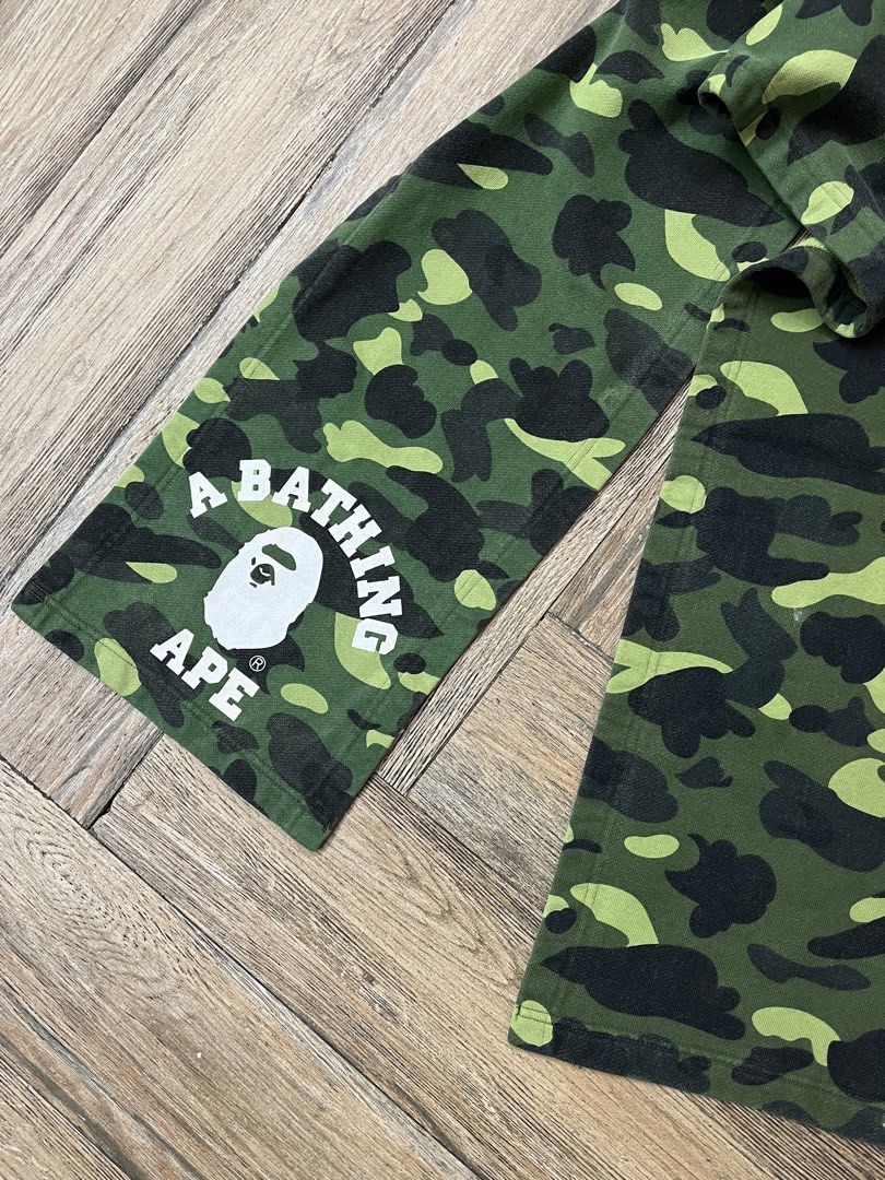 A Bathing Ape BAPE Camo Scarf (Category: Luxury Accessories) located in Manila. Submitted by sleamdaily222 (Listing ID 1450558246, Image 2). Description: - Authentic A Bathing Ape (BAPE) Green Camo Scarf - Features iconic BAPE head logo - Made from 100% high-quality cotton - Proudly manufactured in Japan - Elevates any streetwear look with a pop of color and brand recognition.
