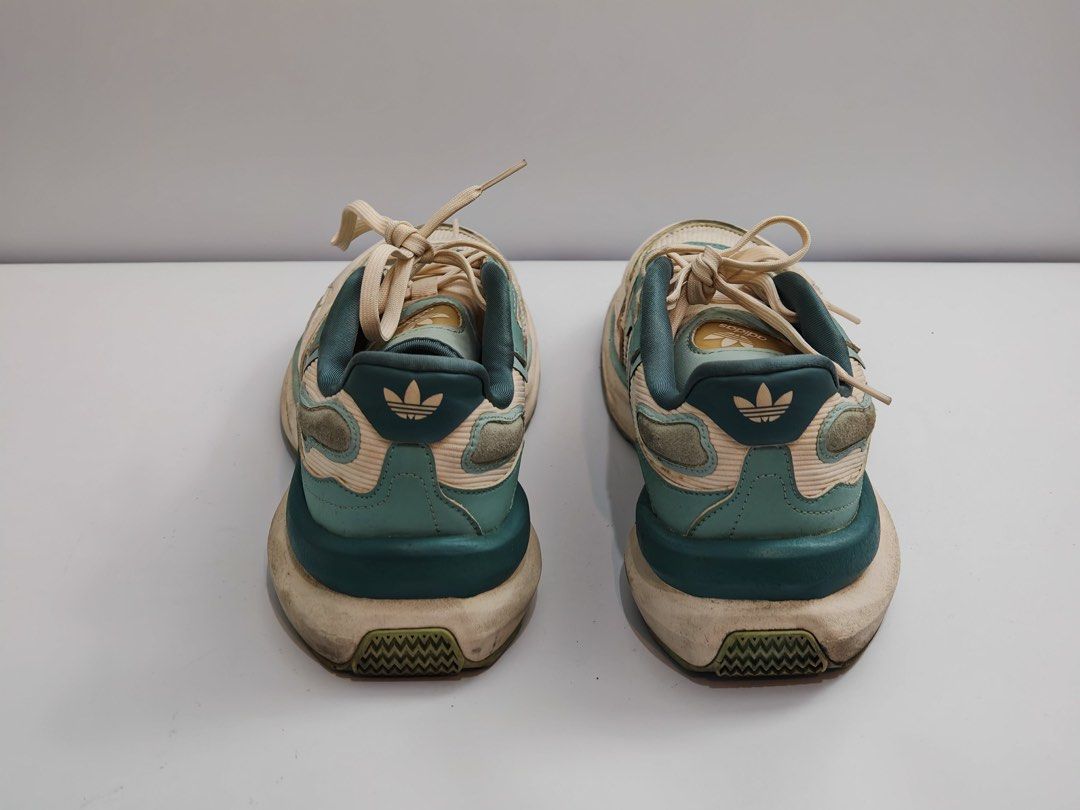 Adidas Ozworld Ozweego Sneakers (Category: Sneakers) located in Quezon City. Submitted by krismocha (Listing ID 1450688882, Image 3). Description: - Adidas Ozworld Ozweego sneakers - Color: Cream and Teal - Closure: Lace-up - Condition: Worn a few times - Minor scuffs on soles and toe box - Plenty of life left - Ideal for casual wear - Pick up at Quezon City Area: Dream Tower near Eastwood.