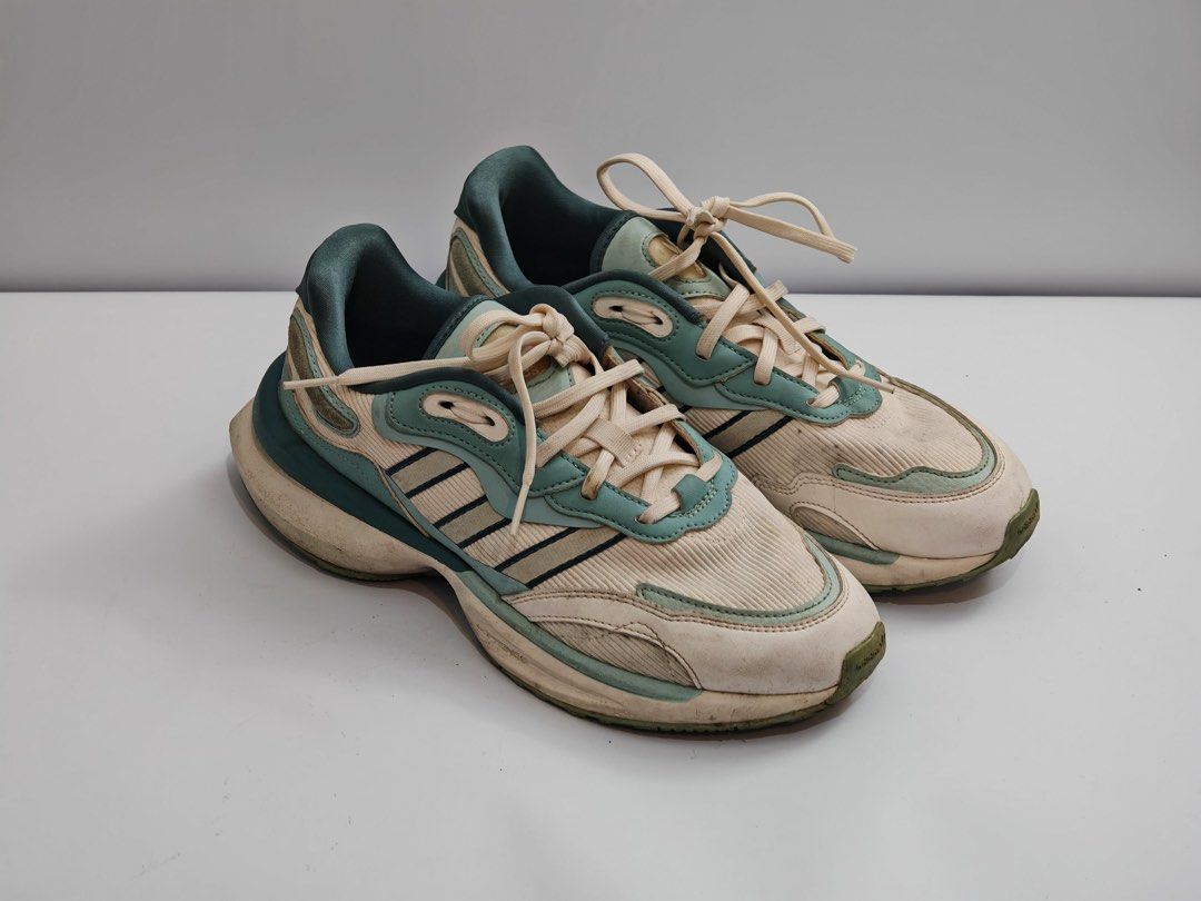 Adidas Ozworld Ozweego Sneakers (Category: Sneakers) located in Quezon City. Submitted by krismocha (Listing ID 1450688882, Image 1). Description: - Adidas Ozworld Ozweego sneakers - Color: Cream and Teal - Closure: Lace-up - Condition: Worn a few times - Minor scuffs on soles and toe box - Plenty of life left - Ideal for casual wear - Pick up at Quezon City Area: Dream Tower near Eastwood.