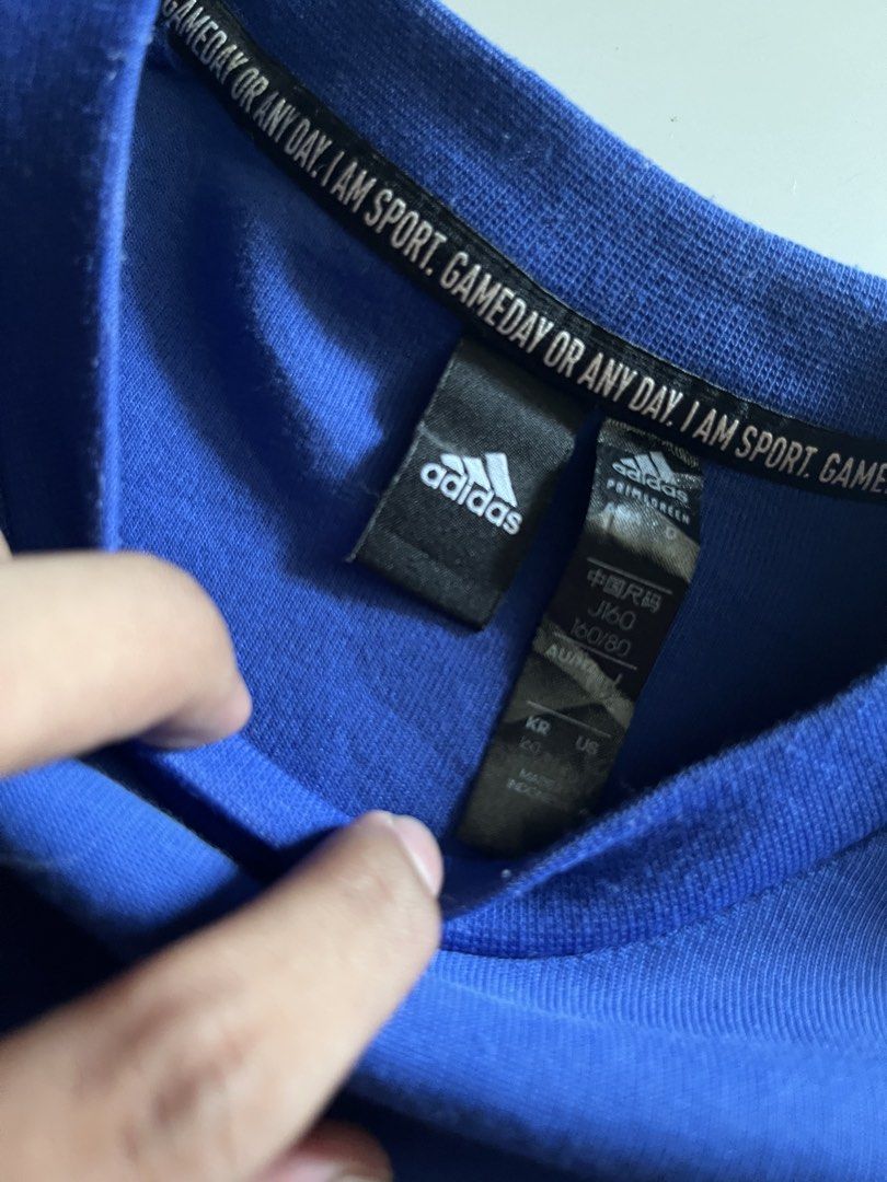 Adidas Pullover Sweater (Category: Coats, Jackets and Outerwear) located in Santa Ana. Submitted by rlave (Listing ID 1450583715, Image 3). Description: Preloved Adidas blue jacket, small size, featuring classic white 3-Stripes detailing along the sleeves and a subtle logo placed at the bottom right corner. Full-zip closure, ribbed cuffs and hem, comfortable relaxed fit — great for layering or everyday casual wear. Item is in good preloved condit