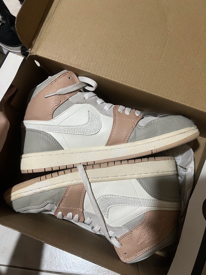 Air Jordan 1 Mid SE "Light Arctic Pink" (Category: Sneakers) located in Manila. Submitted by helpm3declutt3rrr (Listing ID 1450561289, Image 1). Description: - Air Jordan 1 Mid SE - Colorway: Arctic Pink and Grey - Materials: Mix of suede and leather - Classic Jordan silhouette - Includes original box - Ideal addition to any sneaker collection.
