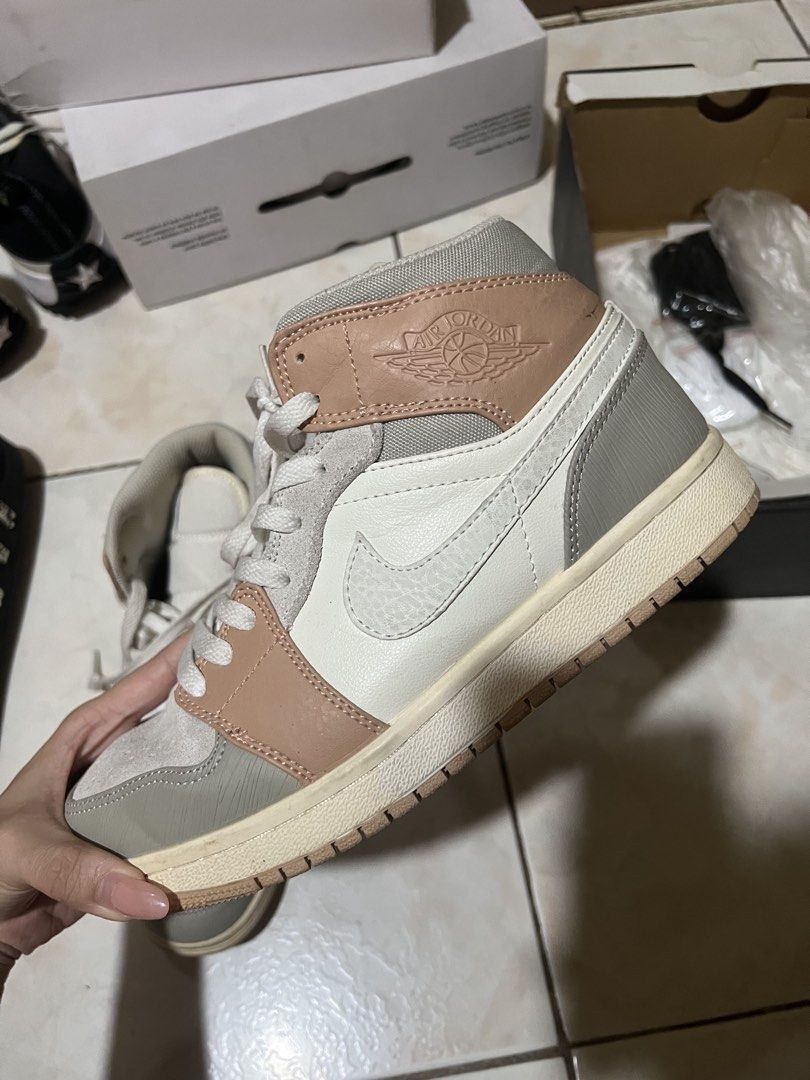 Air Jordan 1 Mid SE "Light Arctic Pink" (Category: Sneakers) located in Manila. Submitted by helpm3declutt3rrr (Listing ID 1450561289, Image 2). Description: - Air Jordan 1 Mid SE - Colorway: Arctic Pink and Grey - Materials: Mix of suede and leather - Classic Jordan silhouette - Includes original box - Ideal addition to any sneaker collection.