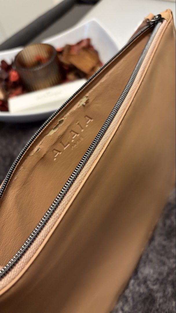 Alaia Paris Leather Pouch with Dust Bag (Category: Luxury Bags & Wallets) located in Paranaque City. Submitted by preamata (Listing ID 1450564918, Image 3). Description: Authentic Alaïa Leather Pouch with Dust Bag ❌SRP: ₱15,000 SELLING FOR ONLY:₱3,499.00 (Fixed) ✅ Authentic ✅No exterior flaws just normal signs of usage ⚫️well used ⚫️physical flaws on the interior due to unused and got stock for a long time.