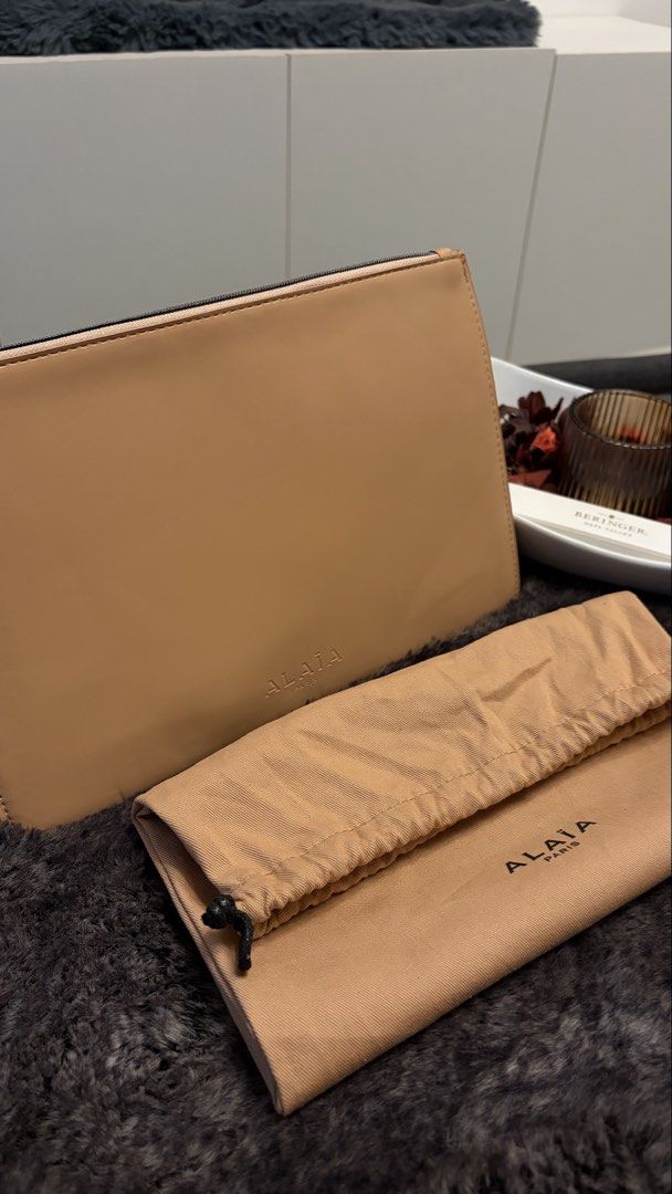 Alaia Paris Leather Pouch with Dust Bag (Category: Luxury Bags & Wallets) located in Paranaque City. Submitted by preamata (Listing ID 1450564918, Image 1). Description: Authentic Alaïa Leather Pouch with Dust Bag ❌SRP: ₱15,000 SELLING FOR ONLY:₱3,499.00 (Fixed) ✅ Authentic ✅No exterior flaws just normal signs of usage ⚫️well used ⚫️physical flaws on the interior due to unused and got stock for a long time.
